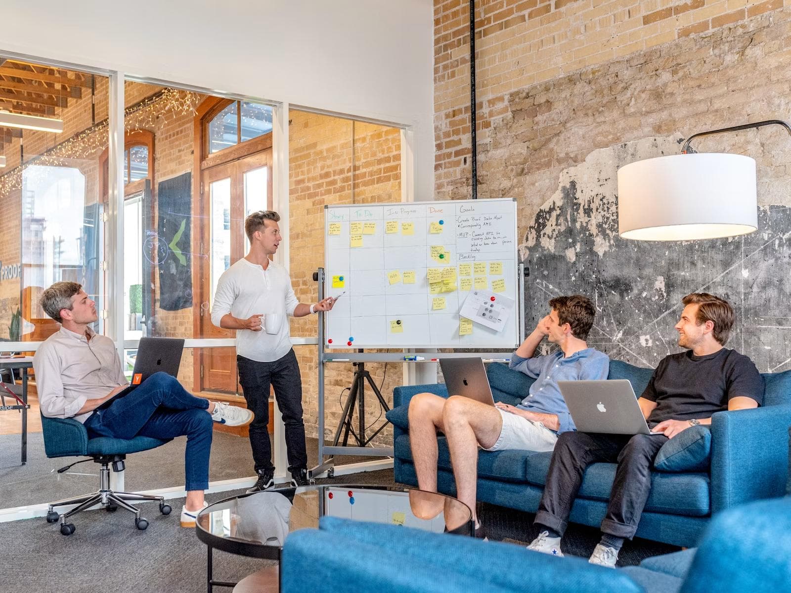 A team gathered in a bright office for a product launch